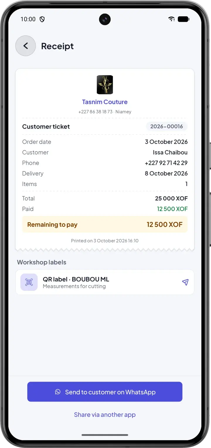 Customer receipt with the workshop QR label and WhatsApp sending
